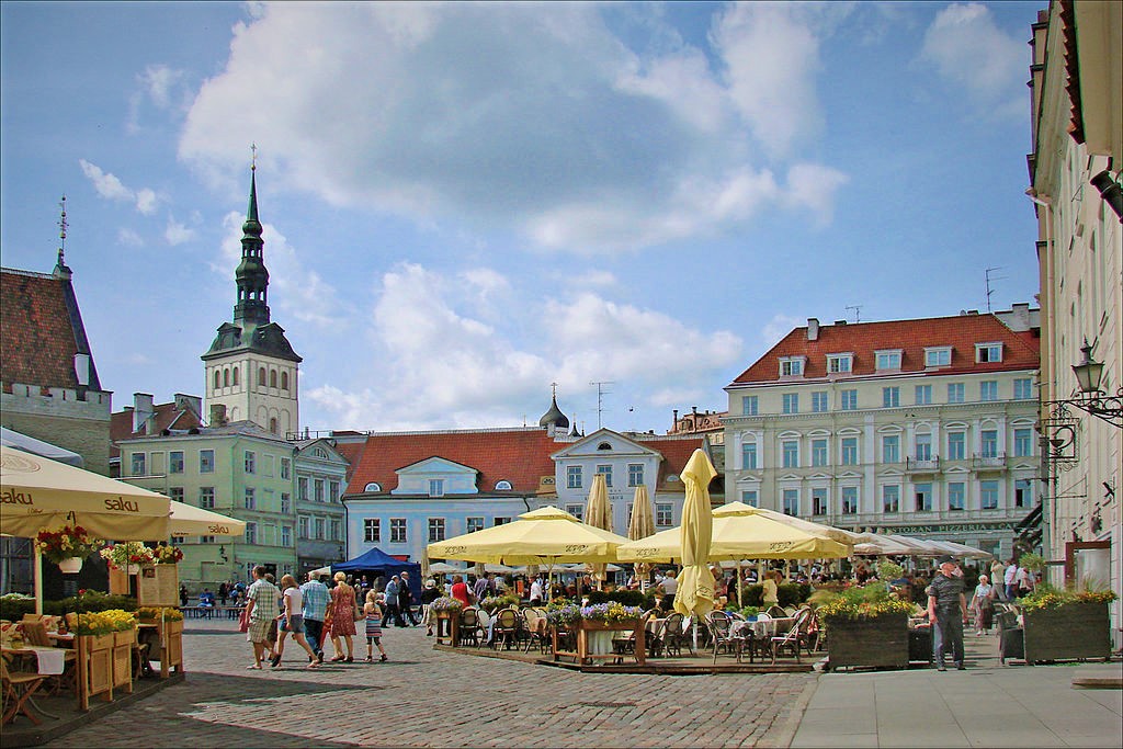 photo of the town square in riga latvia with markets and cloudy sky