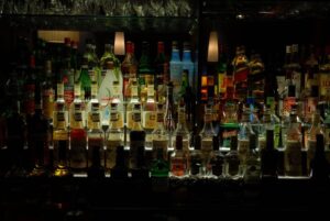 photo of a selection of bottles behind a bar