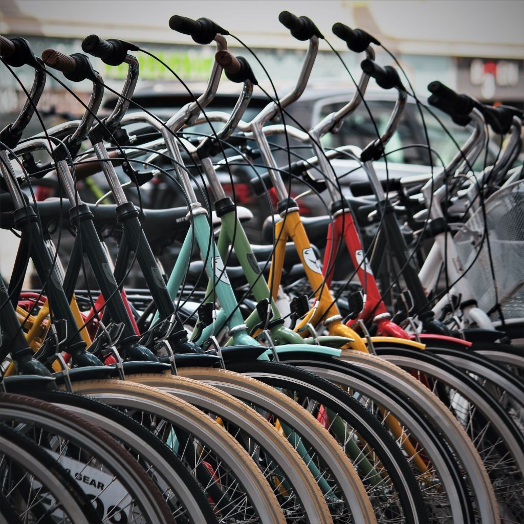 photo of lots of bicycles next to each other in copenhagen denmark