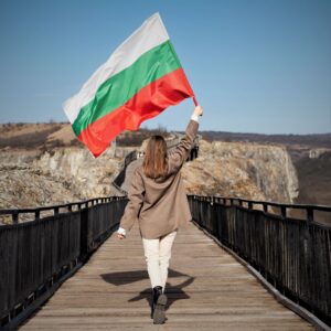 photo of a woman with a bulgarian flag on a bridge in sofia bulgaria