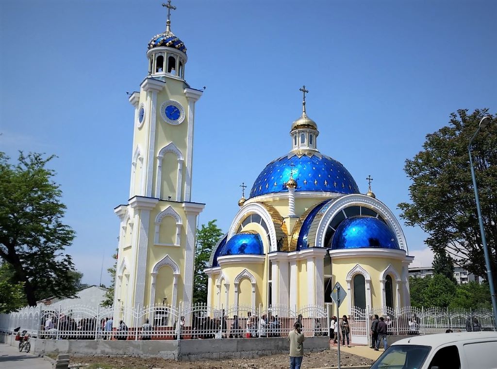 photo of a blue and yellow church building in plovdiv bulgaria