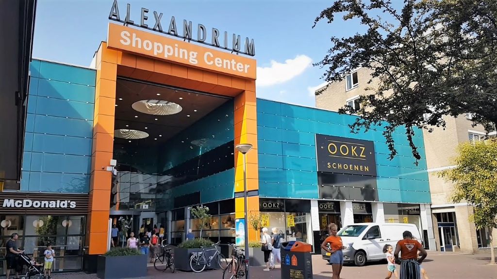 photo of an orange and blue shopping mall in rotterdam netherlands