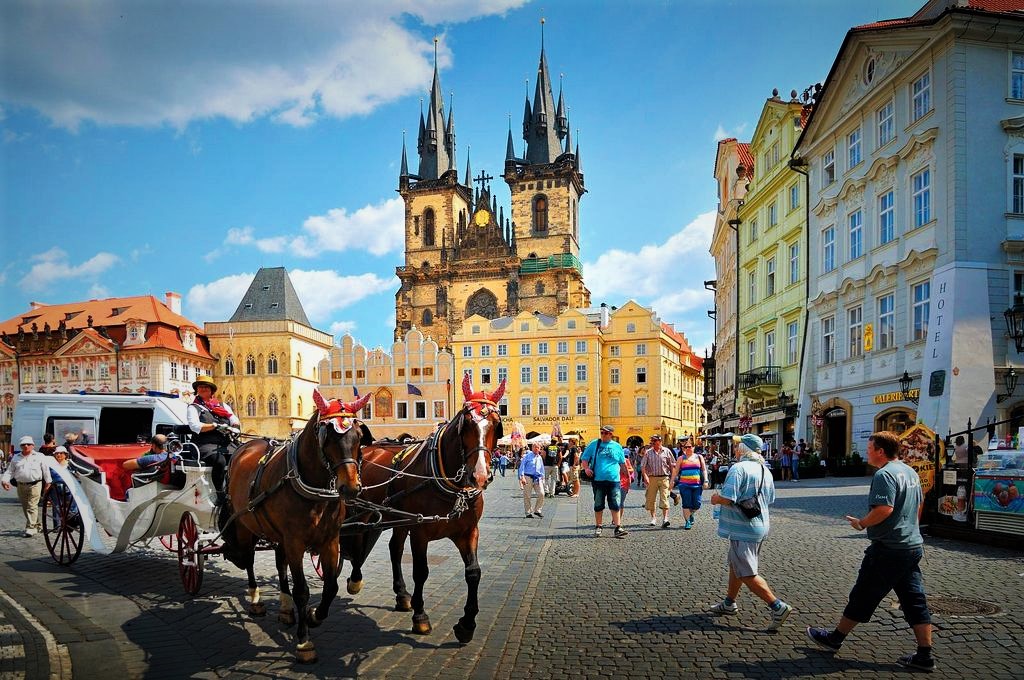 photo of a horse and carriage in old town in prague czech republic