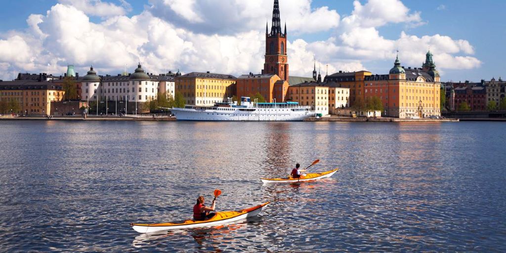 photo of two people kayaking in stockholm sweden