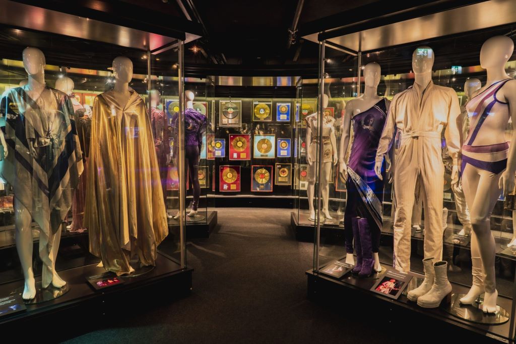 photo of mannequins in fancy clothing in the abba museum in stockholm sweden