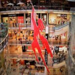 photo of red statue in a shopping centre in prague czech republic