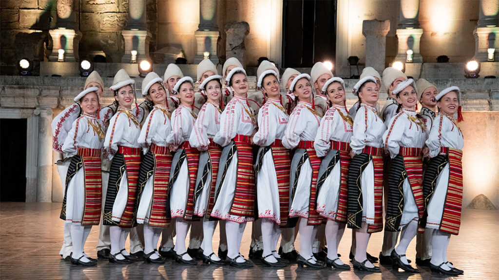 photo of people in white and red dress in plovdiv bulgaria