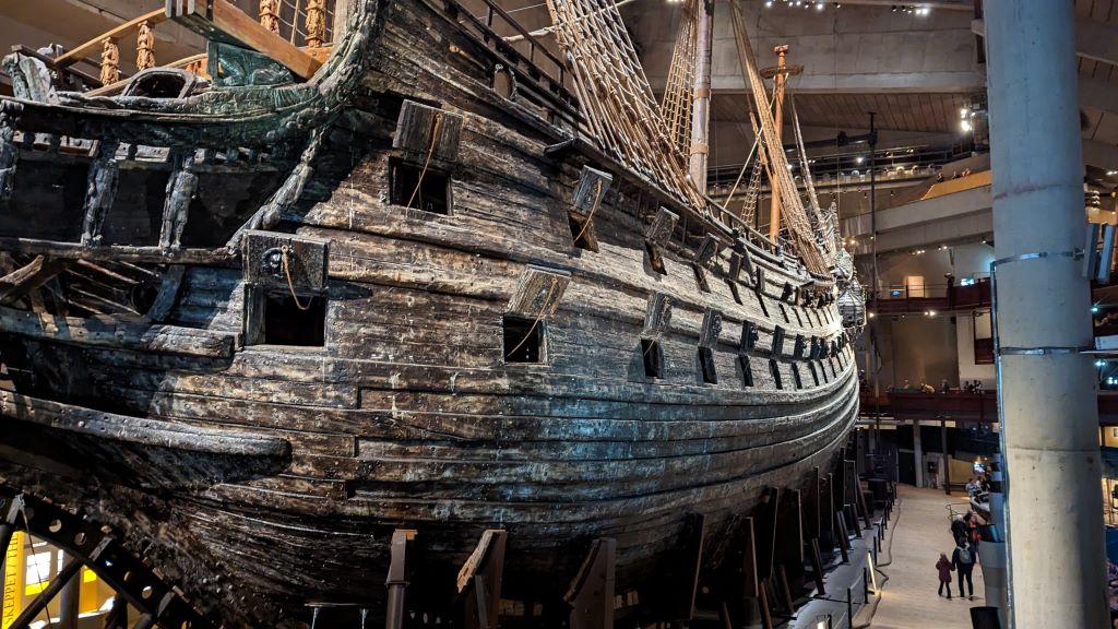 photo of a large wooden ship in a museum in stockholm sweden