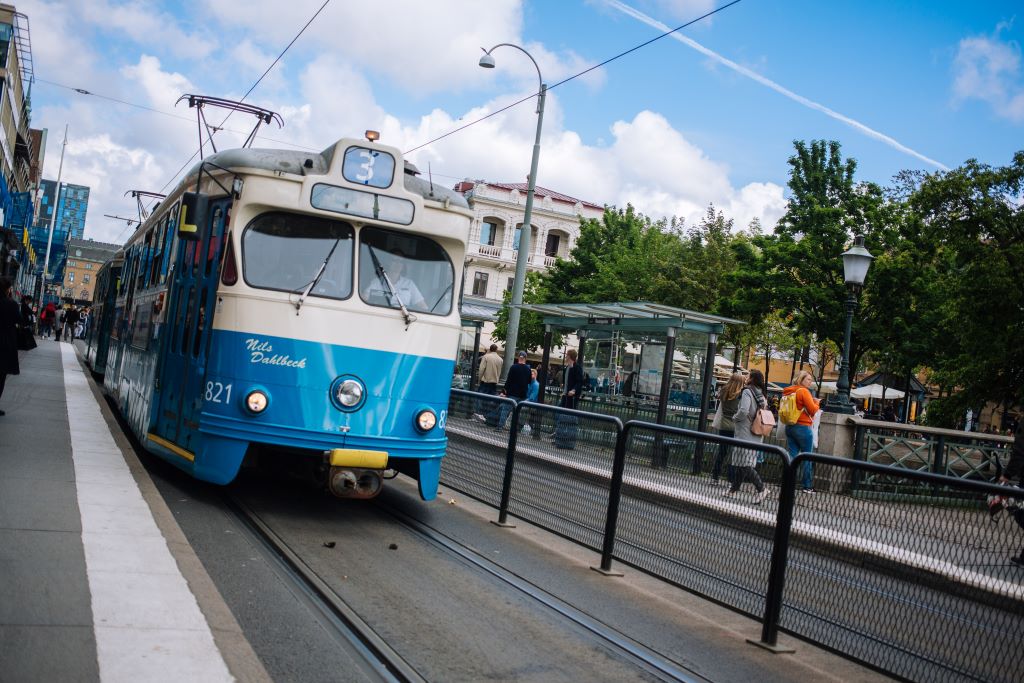 photo of a blue and white tram in gothenburg sweden