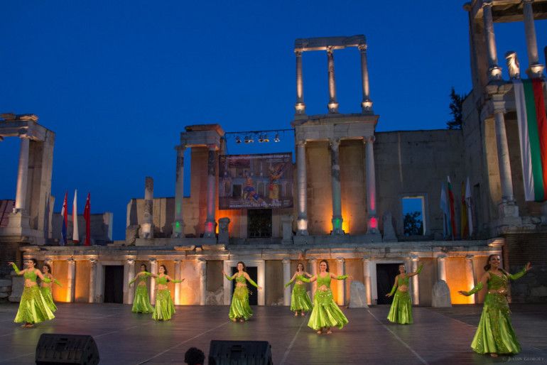 photo of people dancing in old theatre in plovdiv bulgaria