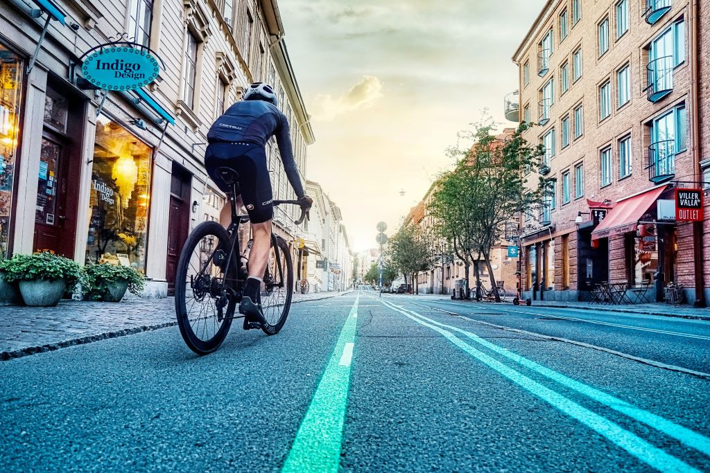 photo of a cyclist on a street in gothenburg sweden