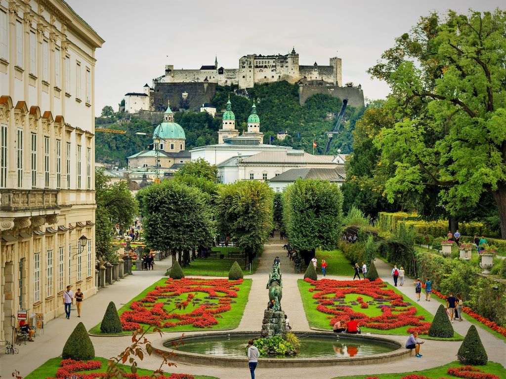 photo of gardens and mountain top palace in salzburg austria