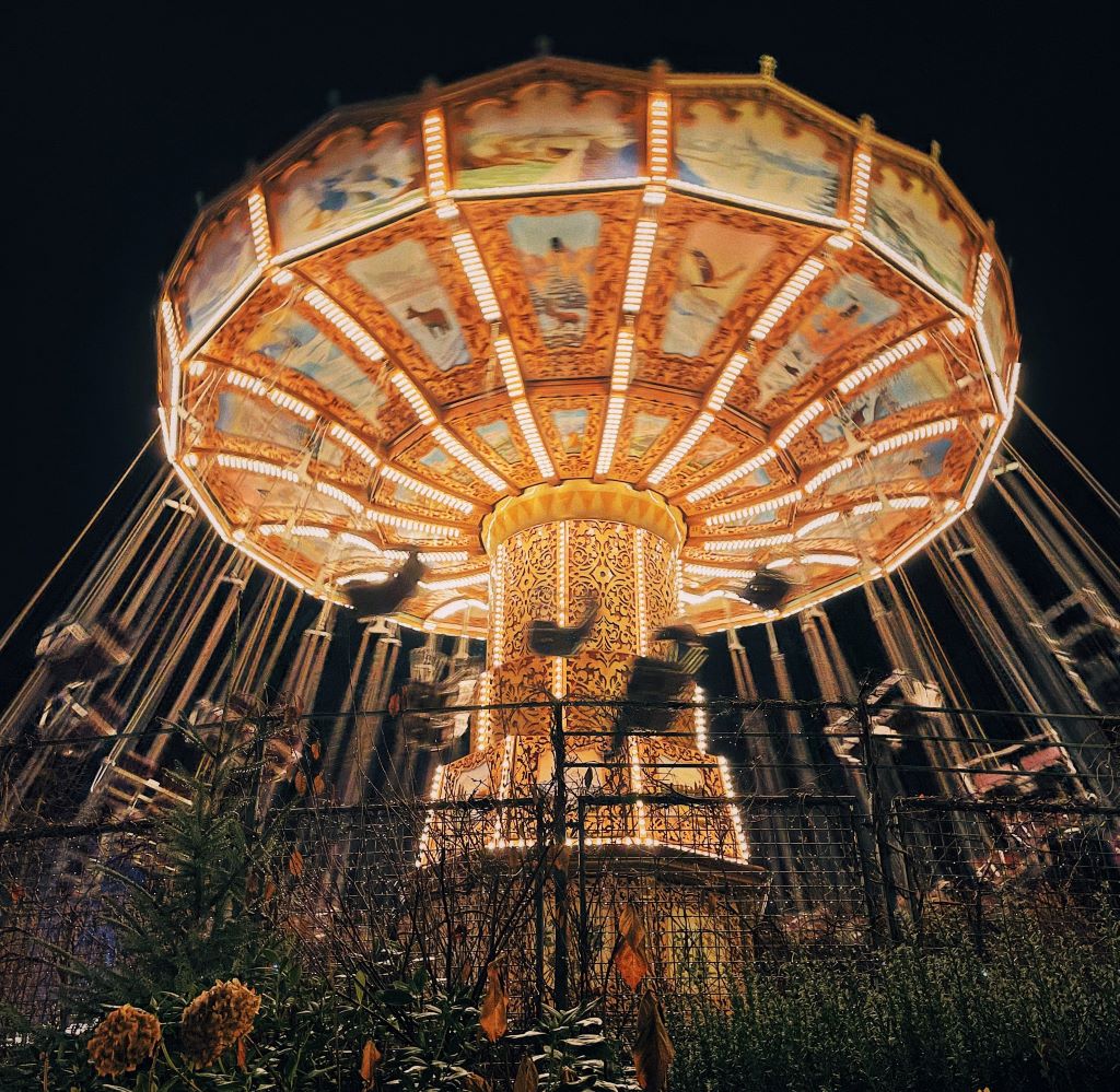 photo of a carousel at night in gothenburg sweden