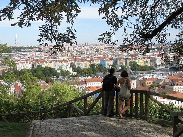 photo of a couple enjoying a view of prague czech republic
